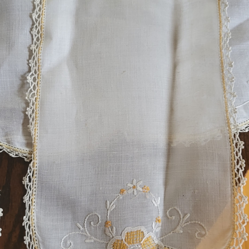 Antique hand embroidered linen dresser set.